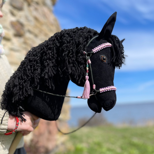 Custom black hobby horse with bridle, perfect stick horse gift for kids. Handmade horse toy and pony on a stick, great for horse lovers. Fun equestrian toy and riding toy for kids, galloping horse design.