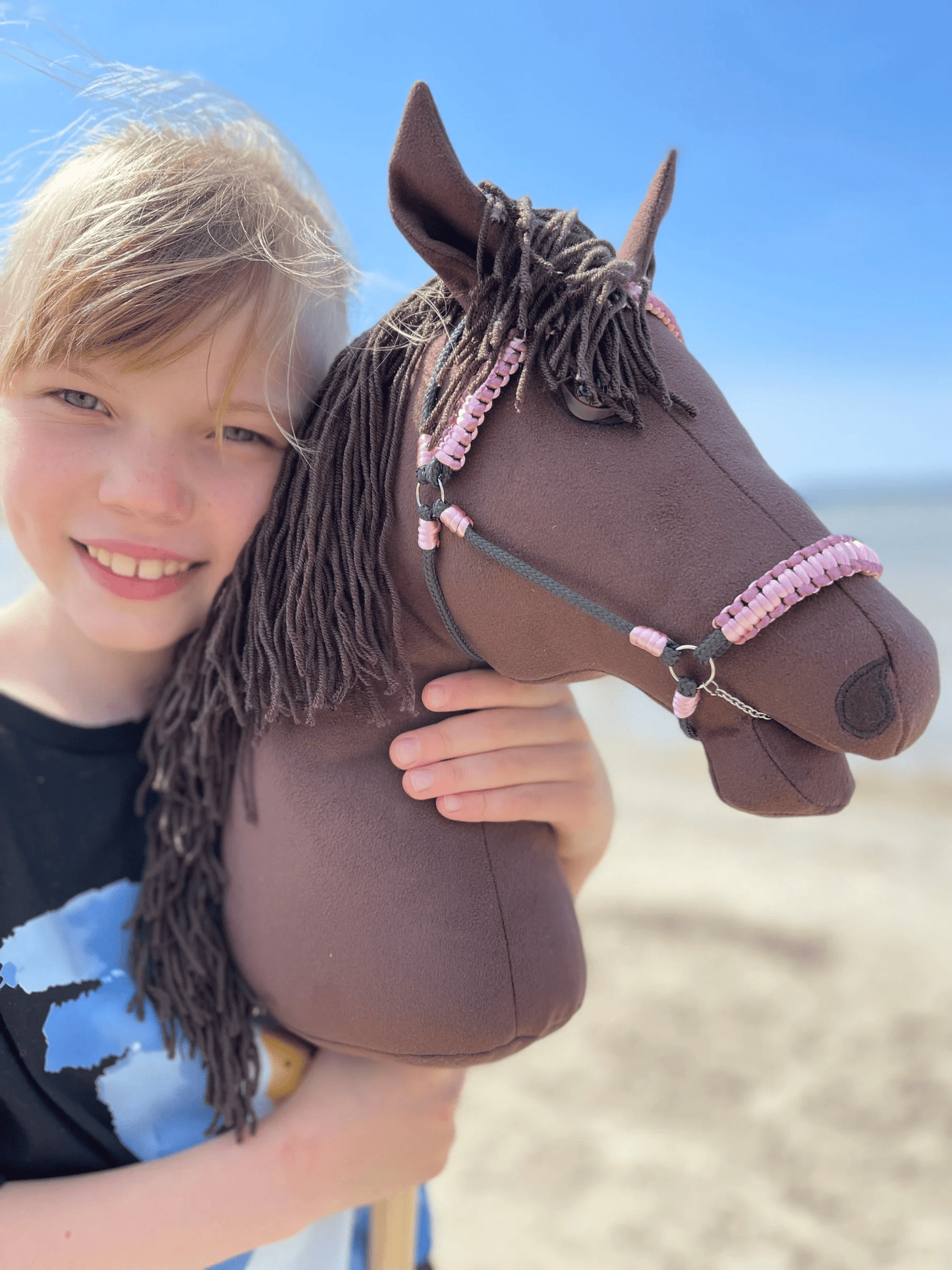 Dark brown handmade hobby horse on a stick, featuring custom name option and matching bridle. A beautiful horse toy gift for kids, pony lovers, and equestrian fans. Perfect riding toy for kids and horse lover gift idea.