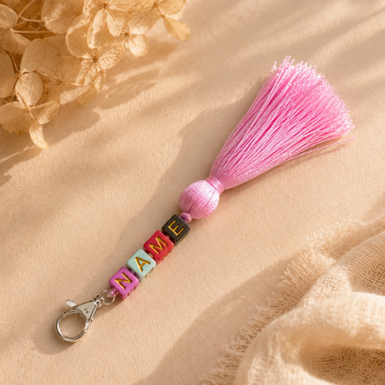 Custom hobby horse name tag with tassel and colorful letter beads