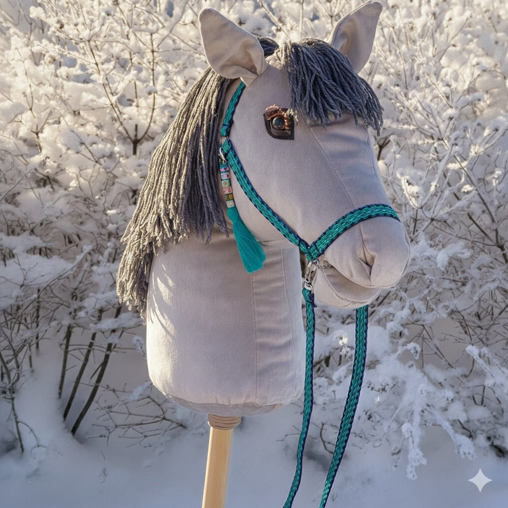 Close-up of handmade hobby horse head, gray velour fabric and yarn mane